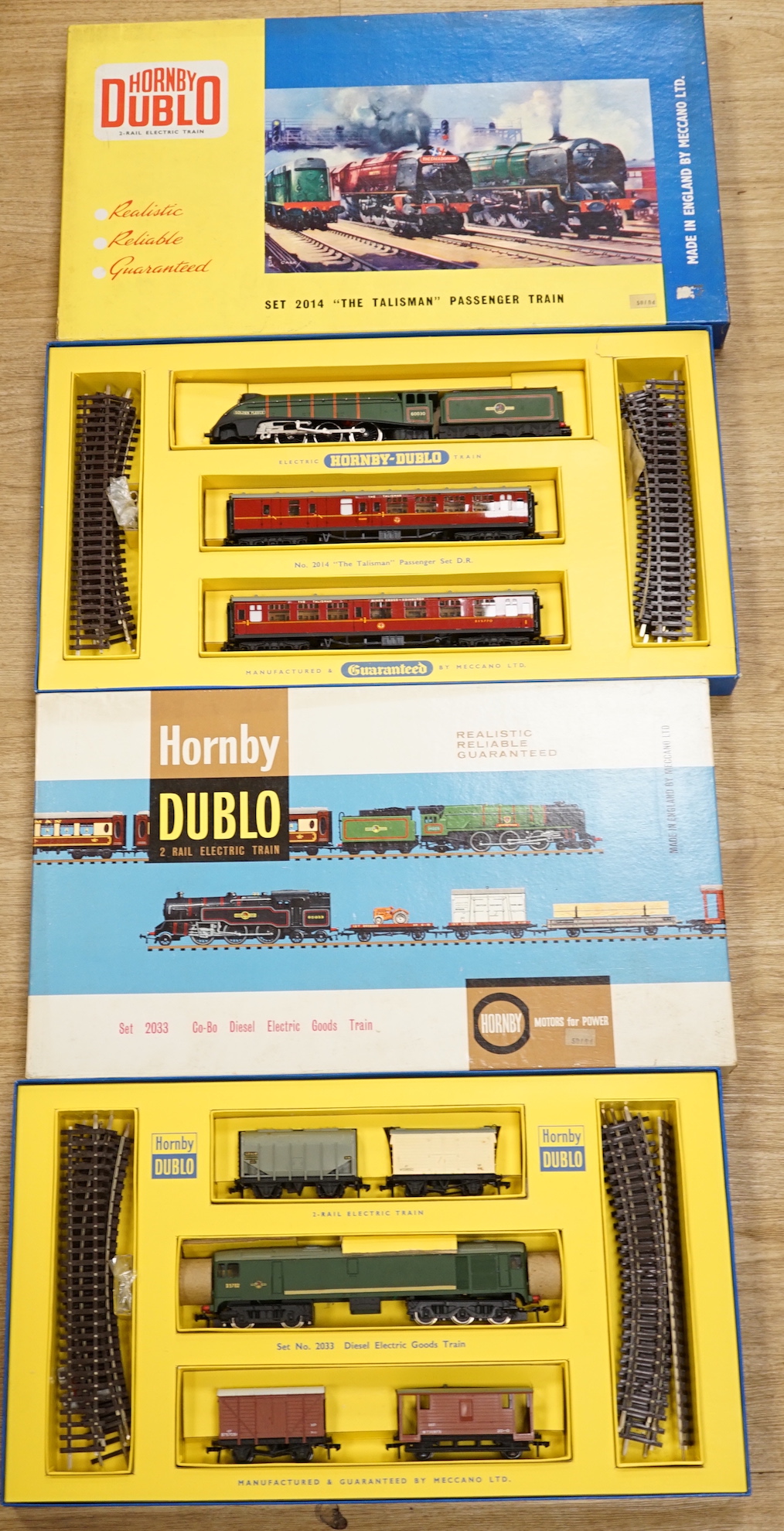 Two boxed Hornby Dublo 2-rail train sets; Set 2014 ‘The Tallisman’ Passenger train set and Set 2033 Co-Bo Diesel Electric Goods Train set